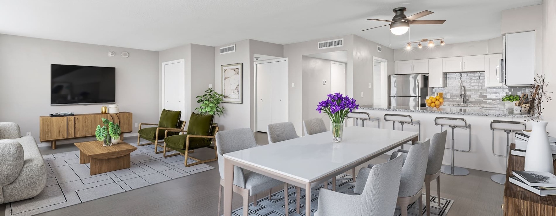 spacious living and kitchen area with bright lighting