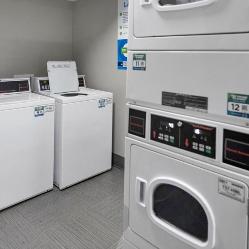 Washing needs are taken care of with our resident laundry room a room with washing machines