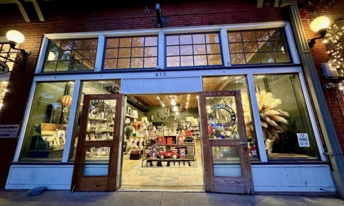 entrance with see through glass storefront windows 